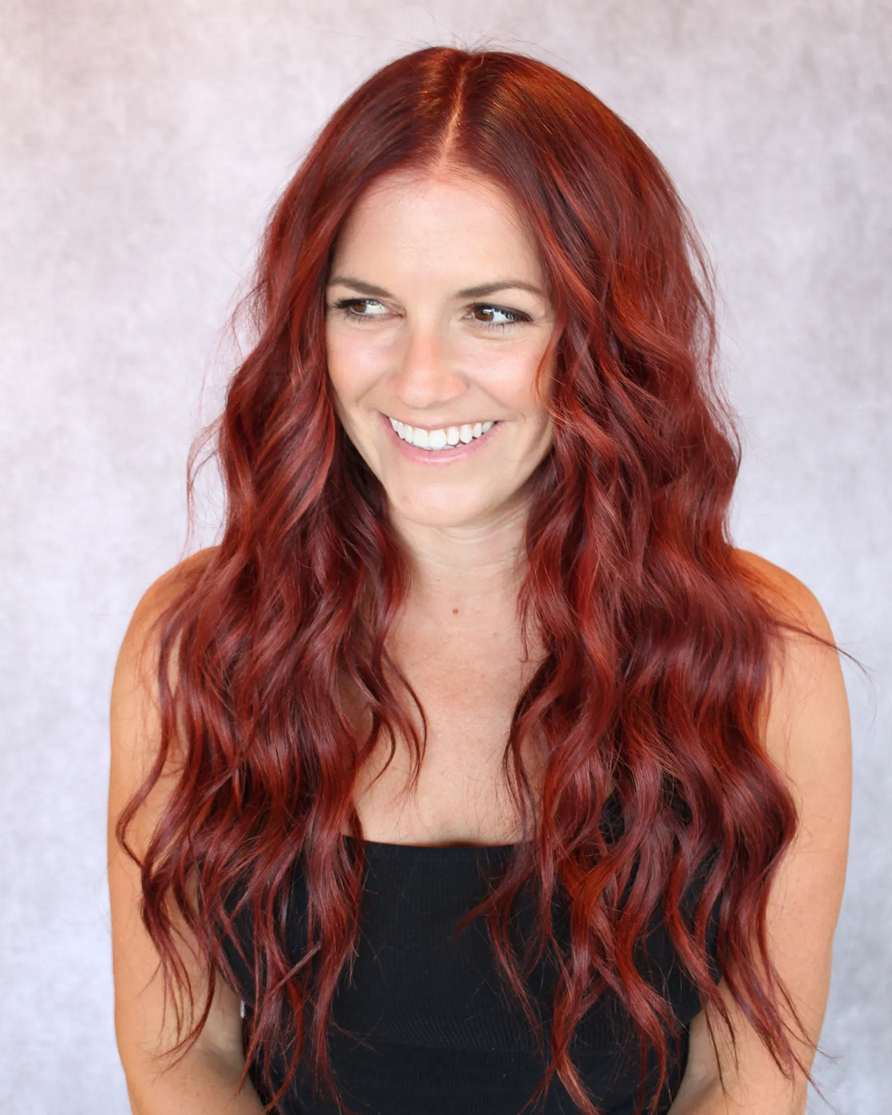 Red color on a Salon Bilancio stylist