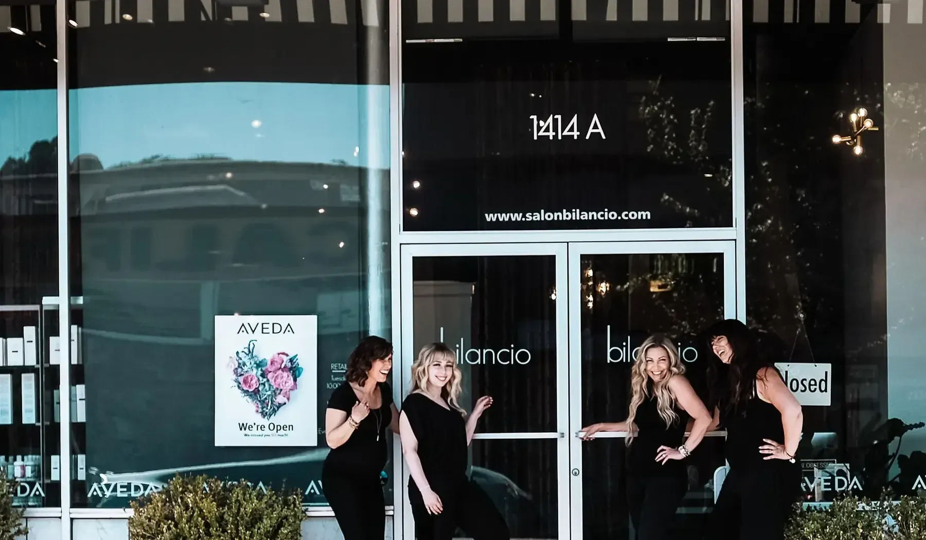 A Salon Bilancio stylist training on the floor